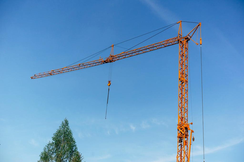 Construction team reviewing plans on site